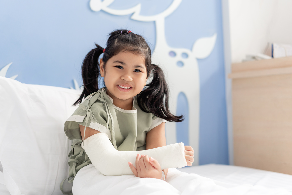 Injured Girl Lying on Bed